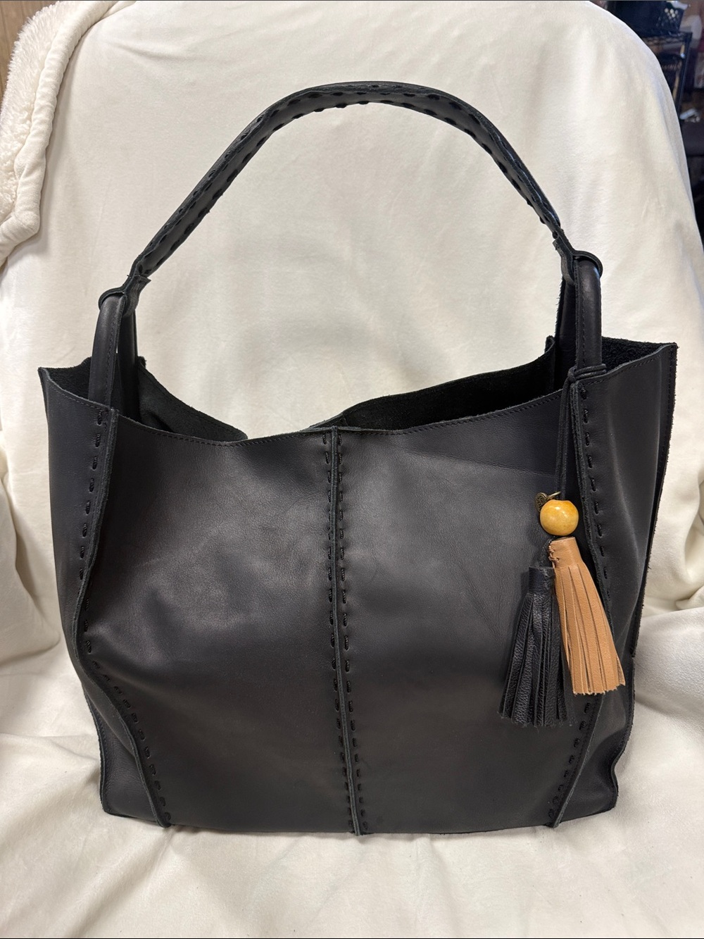 The Sak Los Feliz black large Leather Tote Bag with Tassel Accent